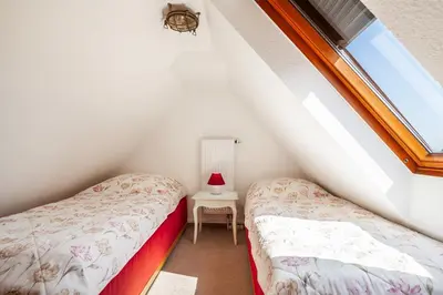 Ein Bett oder Betten in einem Zimmer der Unterkunft Gästehaus Annabel