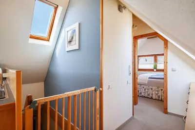Ein Bett oder Betten in einem Zimmer der Unterkunft Gästehaus Annabel