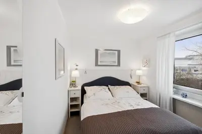 Ein Bett oder Betten in einem Zimmer der Unterkunft Wohldstrasse 6, Favorite Place Apartment 9