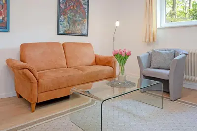 Ein Sitzbereich in der Unterkunft Haus Eva Mar am Meer Appartement 6