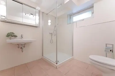 Ein Badezimmer in der Unterkunft Haus Eva Mar am Meer Appartement 6