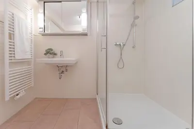 Ein Badezimmer in der Unterkunft Haus Eva Mar am Meer Appartement 6