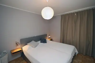 Ein Bett oder Betten in einem Zimmer der Unterkunft Ostseeglück