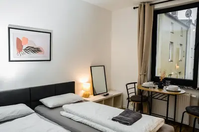 Ein Bett oder Betten in einem Zimmer der Unterkunft Cozy and central Apartment Lübeck