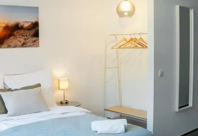 Ein Bett oder Betten in einem Zimmer der Unterkunft Studio Apartment am Kurpark