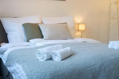 Ein Bett oder Betten in einem Zimmer der Unterkunft Studio Apartment am Kurpark