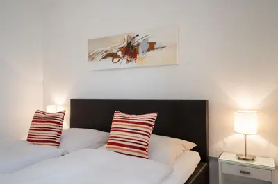 Ein Bett oder Betten in einem Zimmer der Unterkunft Seesand Nr 4