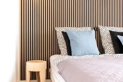 Ein Bett oder Betten in einem Zimmer der Unterkunft Ferienhaus Das Kleine Strandhaus Scharbeutz