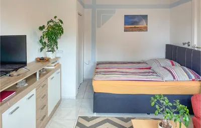 Ein Bett oder Betten in einem Zimmer der Unterkunft Gorgeous Apartment In Kalkhorst