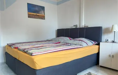 Ein Bett oder Betten in einem Zimmer der Unterkunft Gorgeous Apartment In Kalkhorst