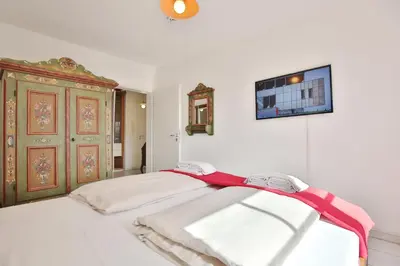 Ein Bett oder Betten in einem Zimmer der Unterkunft Haus Strandstrasse 150 Appartement 11