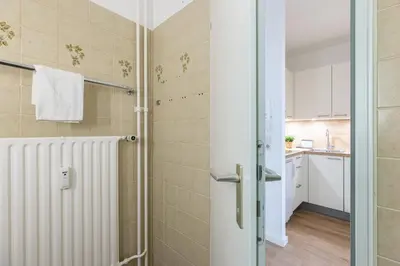 Ein Badezimmer in der Unterkunft Ferienwohnung Meeresstrand, App 304