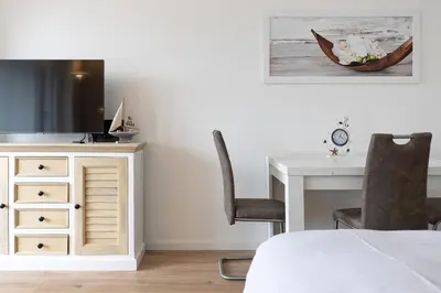 TV/Unterhaltungsangebot in der Unterkunft Ferienwohnung Meeresstrand, App 304