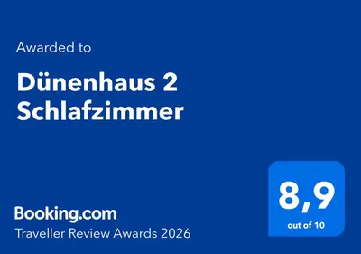 Ein Zertifikat, Auszeichnung, Logo oder anderes Dokument, das in der Unterkunft Dünenhaus ausgestellt ist
