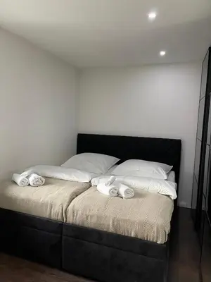Ein Bett oder Betten in einem Zimmer der Unterkunft Wohnen im Reihenhaus auf Zeit in Lübeck