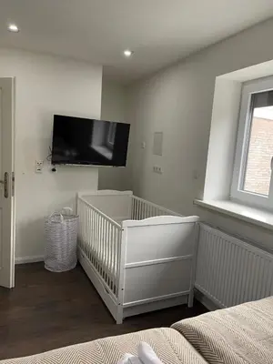 Ein Bett oder Betten in einem Zimmer der Unterkunft Wohnen im Reihenhaus auf Zeit in Lübeck
