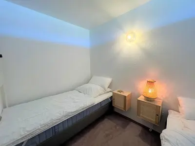 Ein Bett oder Betten in einem Zimmer der Unterkunft Ferienpark Sierksdorf App 660 - Strandlage