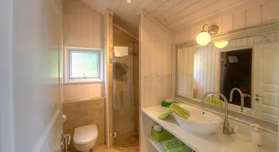 Ein Badezimmer in der Unterkunft Timmenhus - Ferienhäuser am Feldrand