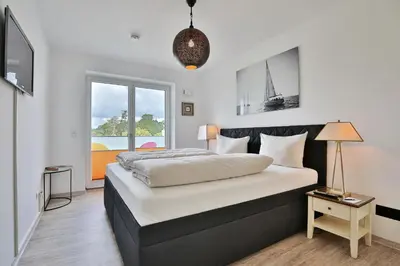 Ein Bett oder Betten in einem Zimmer der Unterkunft Haus Sommertraum Haus Sommertraum, Appartement 5 