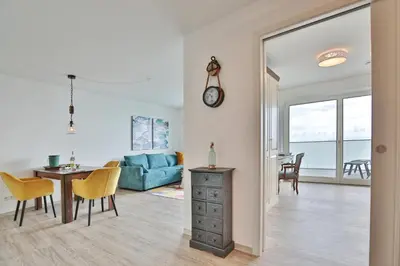 Ein Sitzbereich in der Unterkunft Haus Sommertraum Haus Sommertraum, Appartement 5 