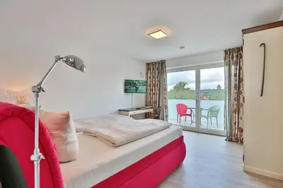 Ein Bett oder Betten in einem Zimmer der Unterkunft Haus Sommertraum Haus Sommertraum, Appartement 6 