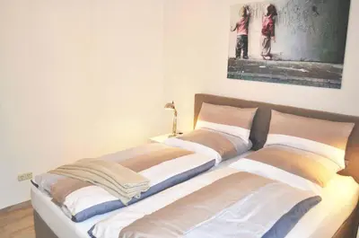 Ein Bett oder Betten in einem Zimmer der Unterkunft Haus Heß Ferienwohnung Nr 04