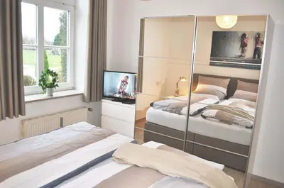 Ein Bett oder Betten in einem Zimmer der Unterkunft Haus Heß Ferienwohnung Nr 04