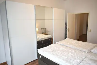 Ein Bett oder Betten in einem Zimmer der Unterkunft Haus Heß Ferienwohnung Nr 07