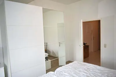Ein Bett oder Betten in einem Zimmer der Unterkunft Haus Heß Ferienwohnung Nr 10