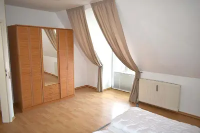 Ein Bett oder Betten in einem Zimmer der Unterkunft Haus Heß Ferienwohnung Nr 12