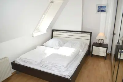 Ein Bett oder Betten in einem Zimmer der Unterkunft Haus Heß Ferienwohnung Nr 12