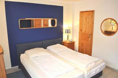 Ein Bett oder Betten in einem Zimmer der Unterkunft Villa Seestern Ferienwohnung Nr 02