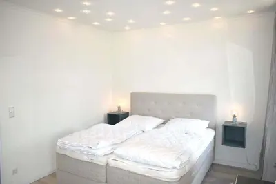 Ein Bett oder Betten in einem Zimmer der Unterkunft Villa Seestern Ferienwohnung Nr 05