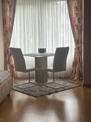 Ein Sitzbereich in der Unterkunft Dünenhaus Zimmer