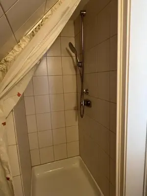 Ein Badezimmer in der Unterkunft Dünenhaus Zimmer