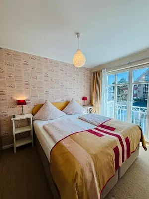 Ein Bett oder Betten in einem Zimmer der Unterkunft Villa Luisa