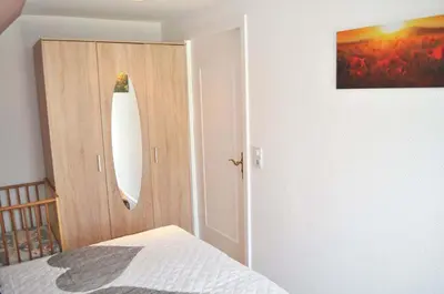 Ein Bett oder Betten in einem Zimmer der Unterkunft Seeadler Ferienwohnung