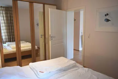 Ein Bett oder Betten in einem Zimmer der Unterkunft Seepassage Ferienwohnung Nr 02