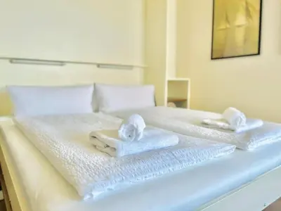 Ein Bett oder Betten in einem Zimmer der Unterkunft Penthaus Horizont mit Meerblick