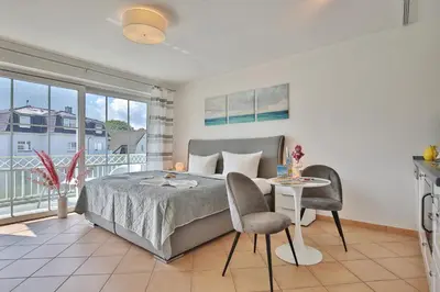 Ein Bett oder Betten in einem Zimmer der Unterkunft Residenz am Kurpark Residenz am Kurpark Appartement 5