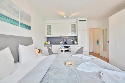 Ein Bett oder Betten in einem Zimmer der Unterkunft Residenz am Kurpark Residenz am Kurpark Appartement 5