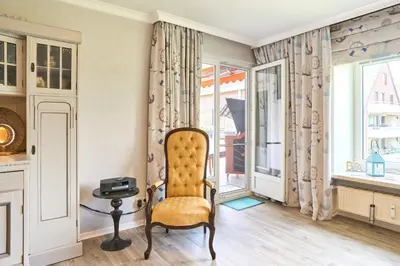 Ein Sitzbereich in der Unterkunft Strandperle Apartment 7