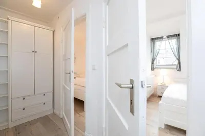 Ein Bett oder Betten in einem Zimmer der Unterkunft Meeresliebling