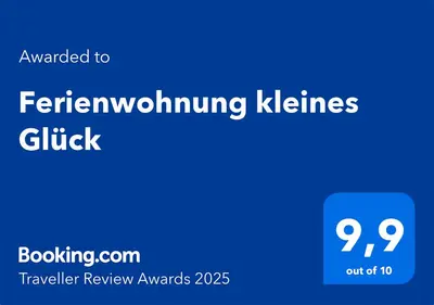 Ein Zertifikat, Auszeichnung, Logo oder anderes Dokument, das in der Unterkunft Ferienwohnung kleines Glück ausgestellt ist