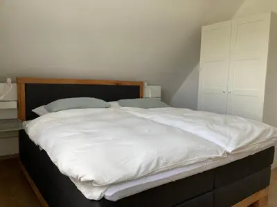 Ein Bett oder Betten in einem Zimmer der Unterkunft Ferienwohnung kleines Glück