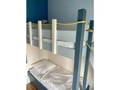 Ein Bett oder Betten in einem Zimmer der Unterkunft Ferienwohnung Seepferdchen Finnlandring