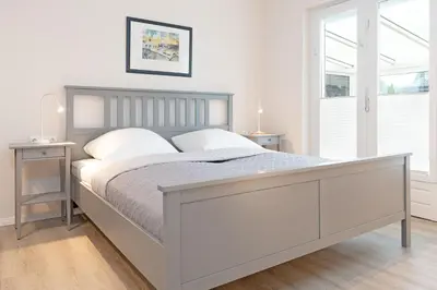 Ein Bett oder Betten in einem Zimmer der Unterkunft Haus Vera