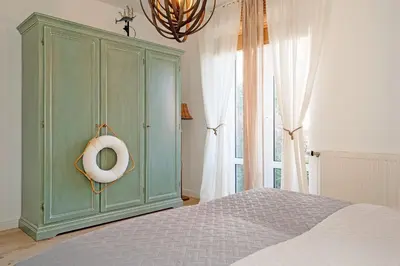Ein Bett oder Betten in einem Zimmer der Unterkunft Zaubermuschel