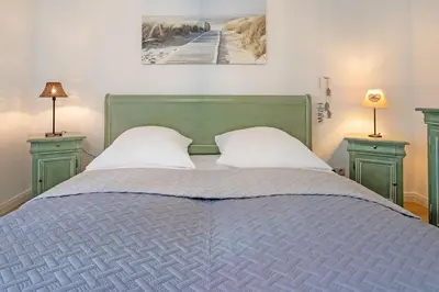 Ein Bett oder Betten in einem Zimmer der Unterkunft Zaubermuschel
