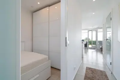 Ein Bett oder Betten in einem Zimmer der Unterkunft Ferienpark Sierksdorf App 131